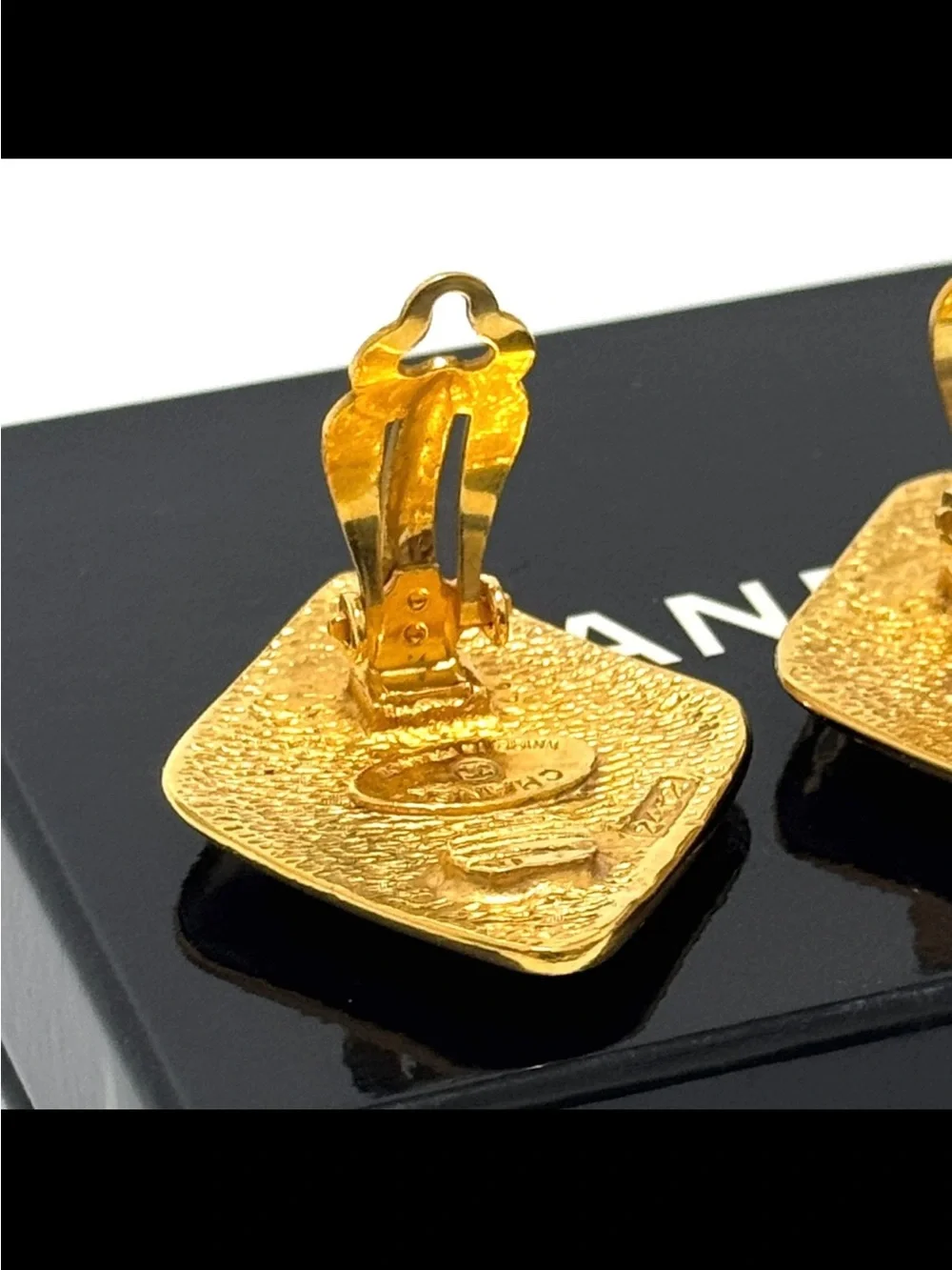 CHANEL Gold Tone Square CC Logo Clip Earrings. PREOWNED.